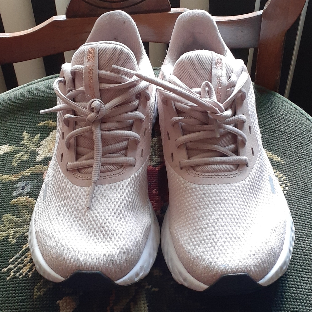 Light pink nike running shoes